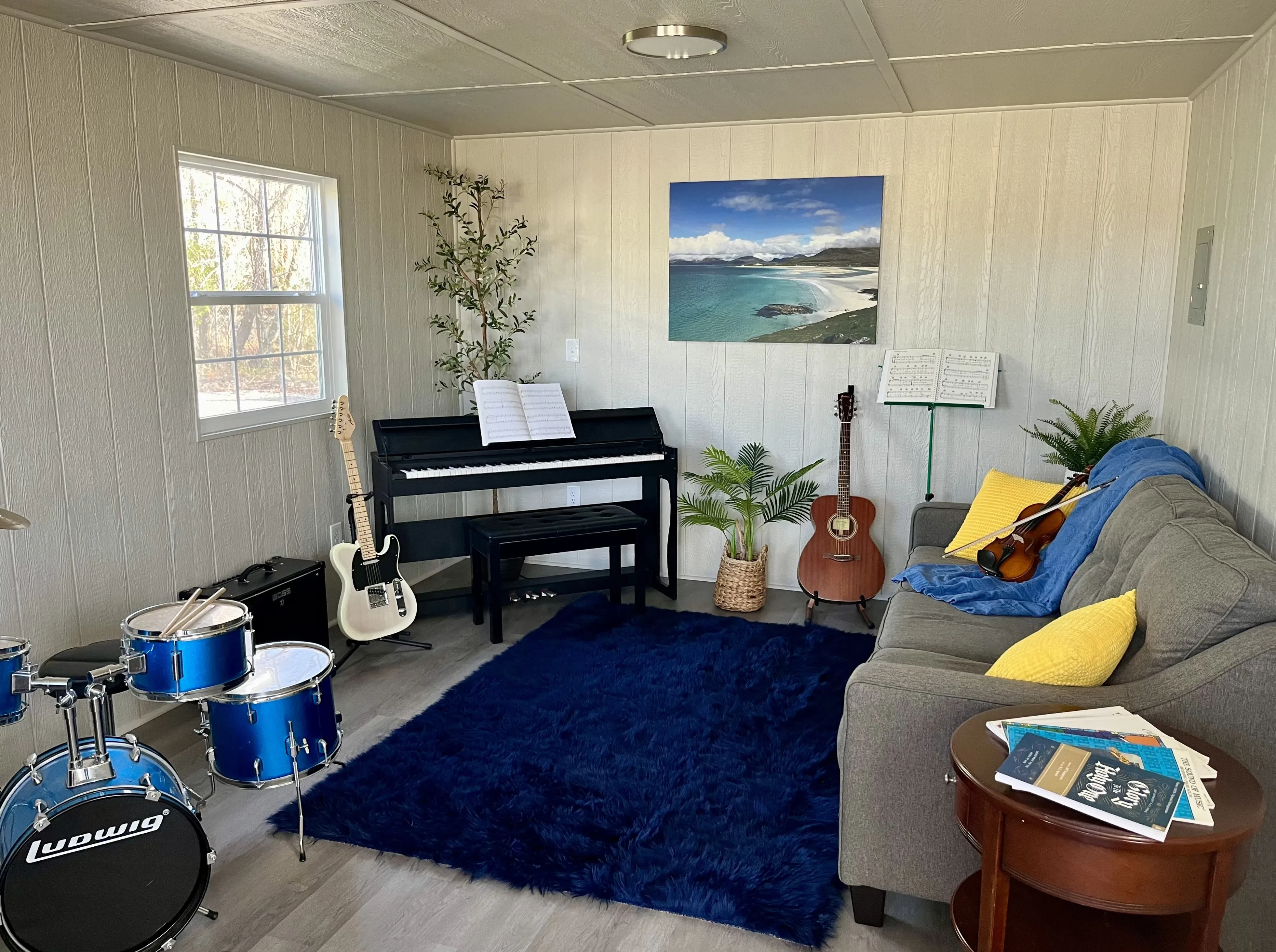 Readymade shed set up as a music room.