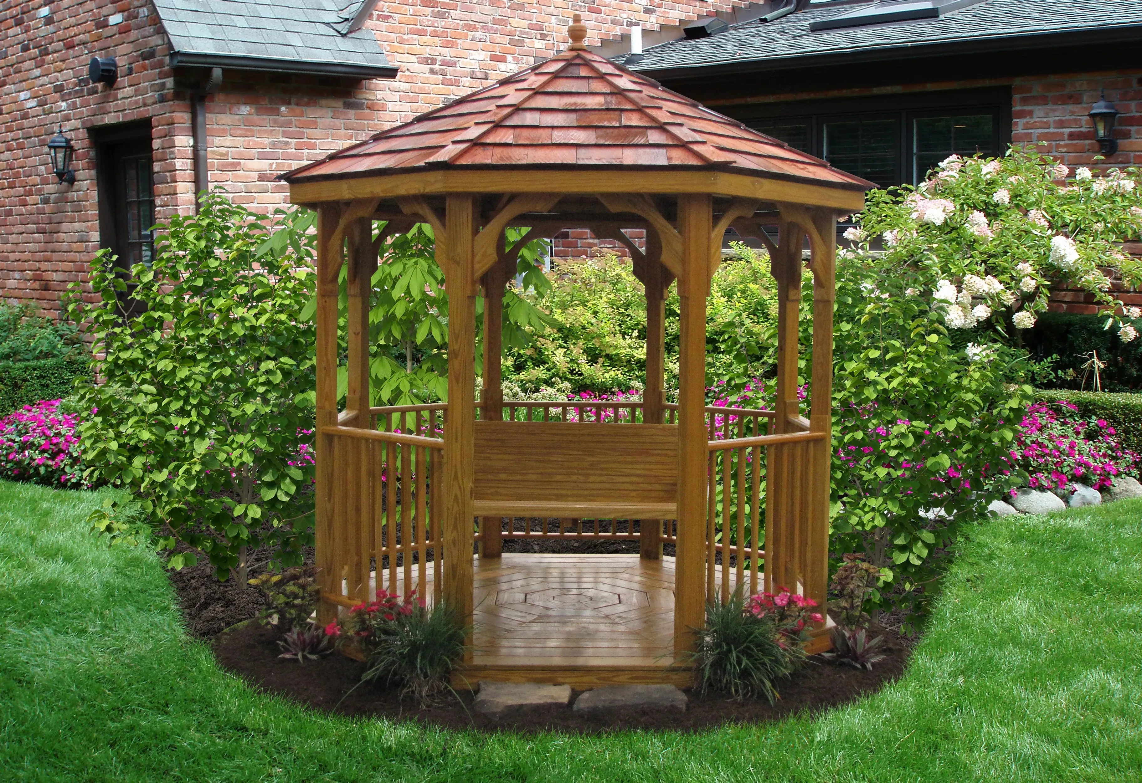 Value Wood Gazebo set up in yard.