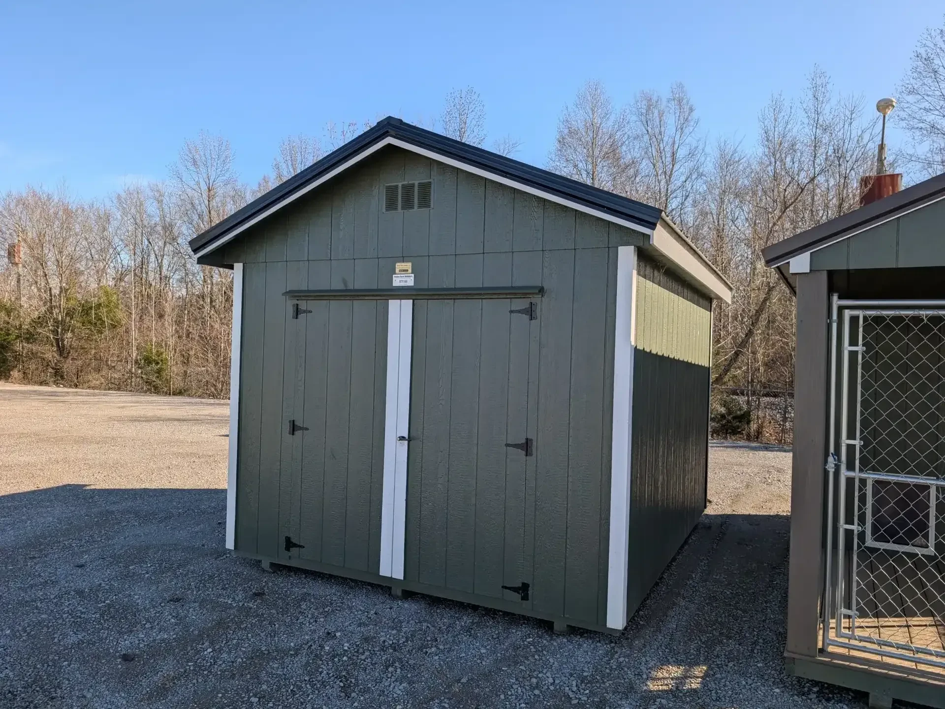 n ushed with a roof overhang and green paint