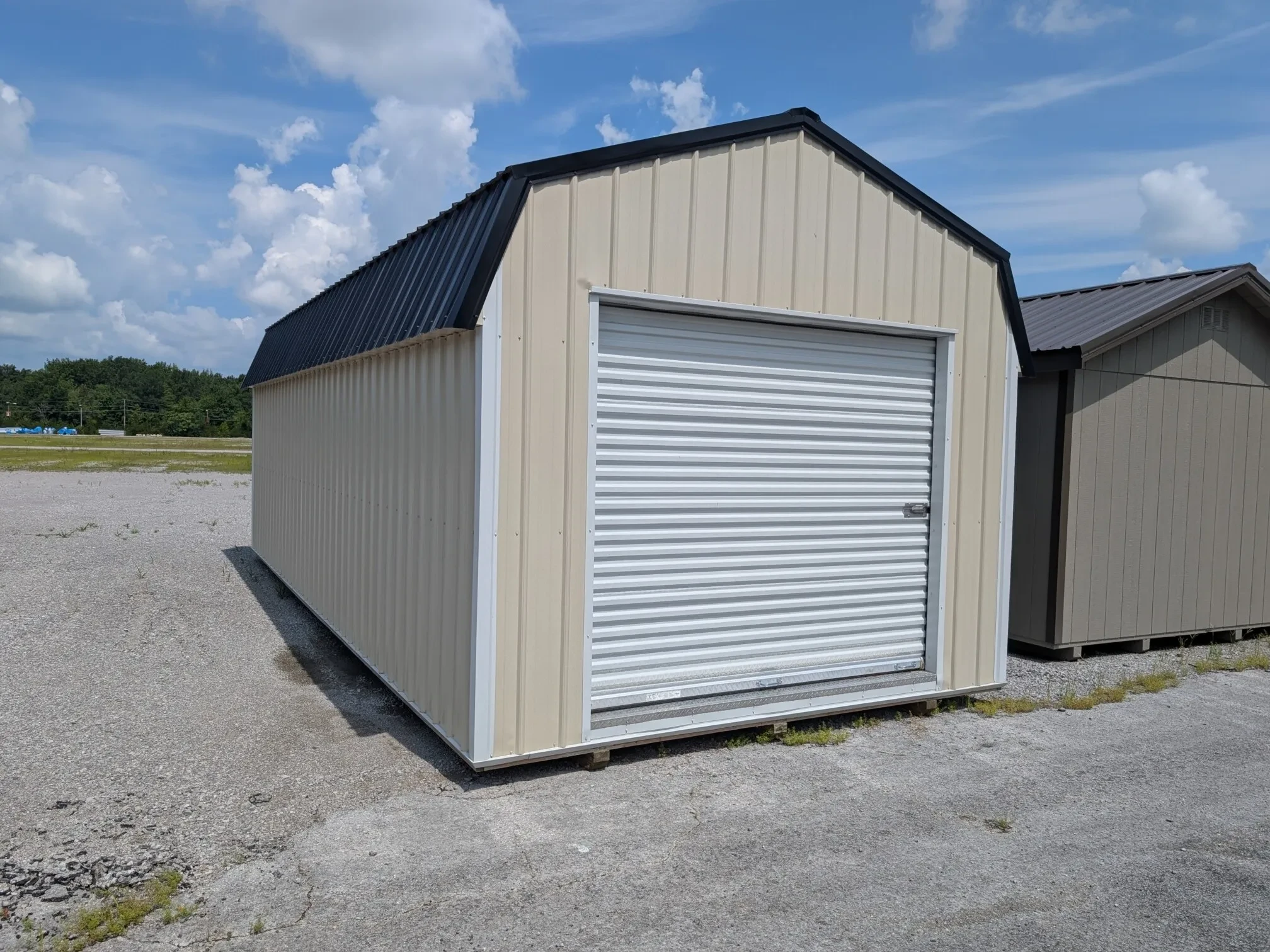 a colored lofted garage with a garage door