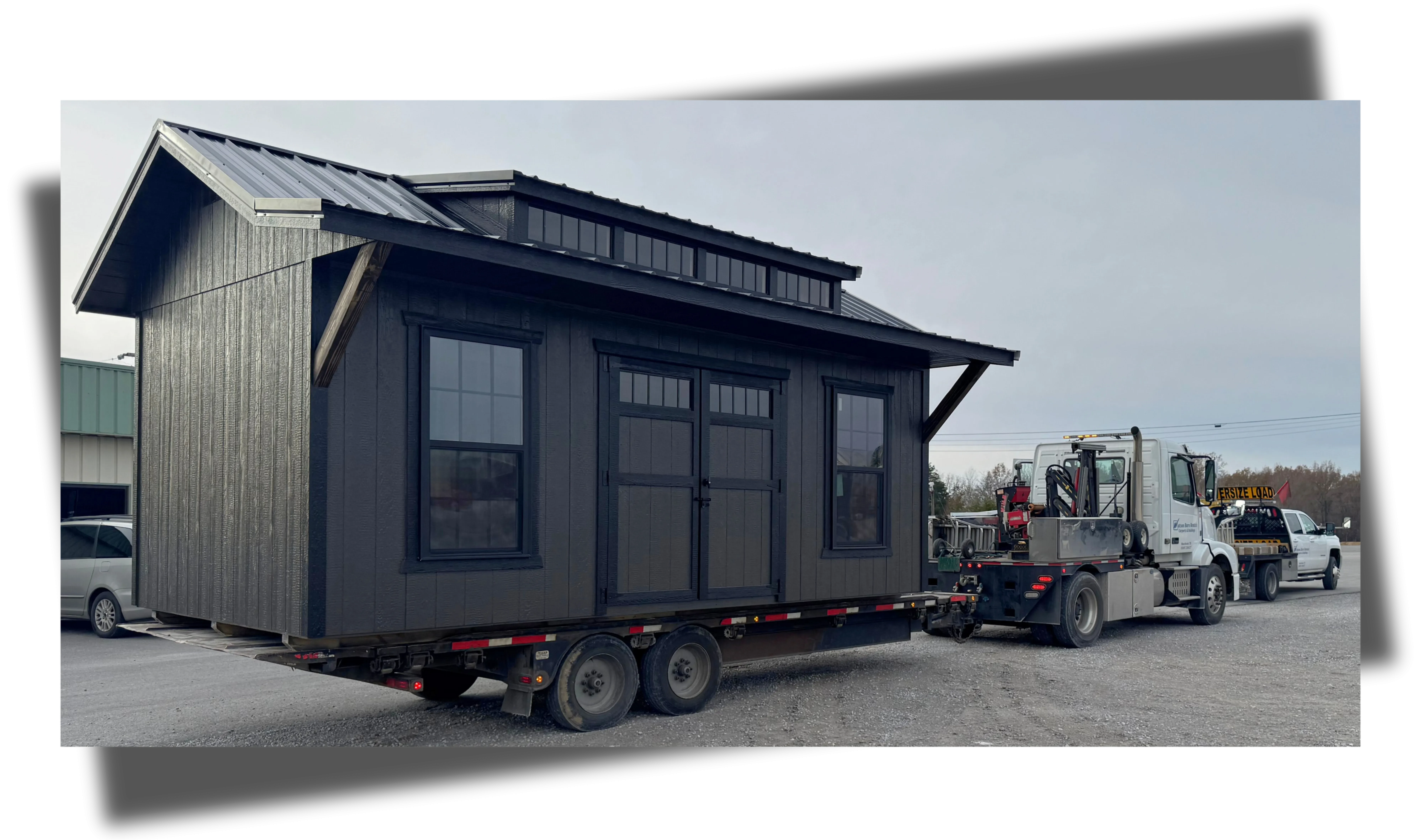 Shed with awning on trailer ready to go out for delivery.