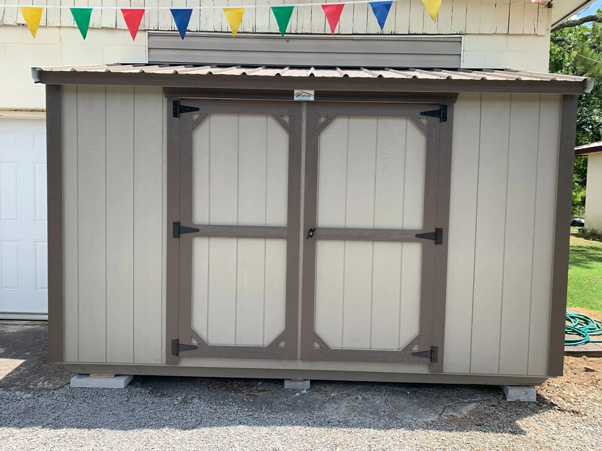 a 4x12 wood leanto style shed colored clay