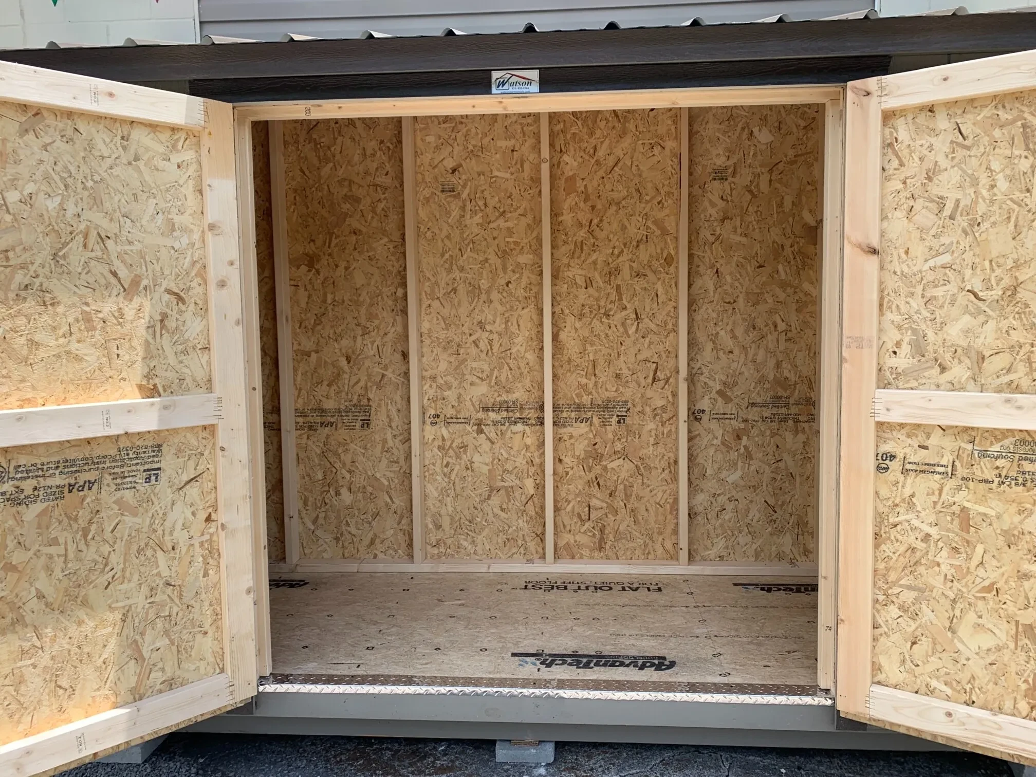 the inside of a wood 4x12 shed