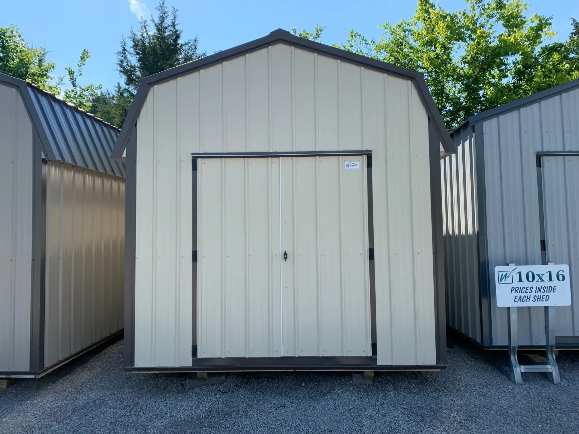 a lofted style metal barn with double doors