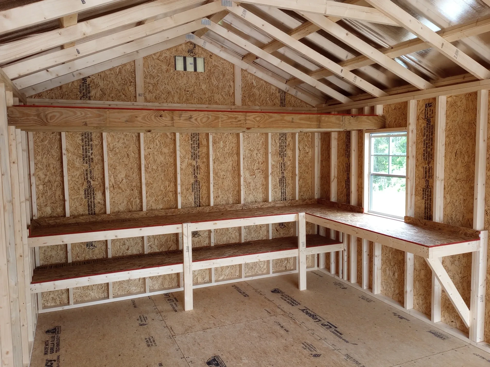 shelves, double shelves, and a loft on the side wall of a garage shed