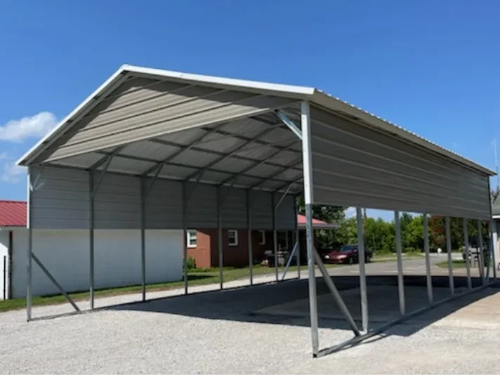 An extra wide squared frame carport with closed gables and side panels