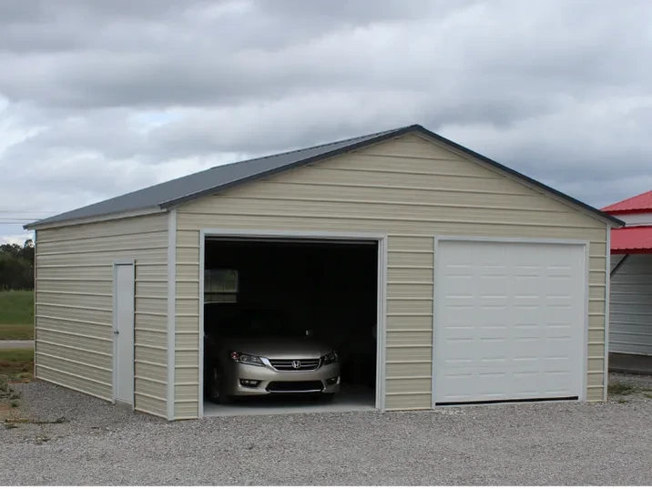 a stone garage with two garage doors and a walkin door
