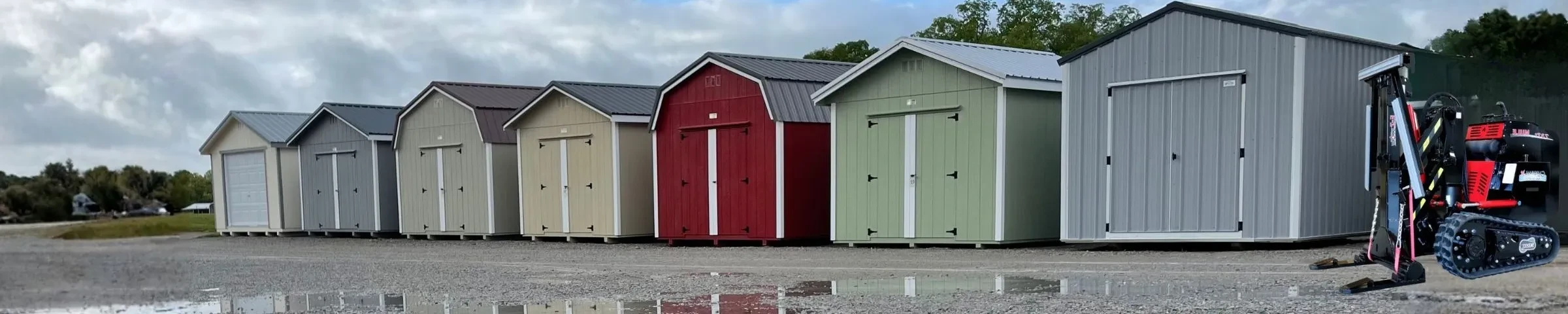 Row of sheds after a rain with a mule ready to load them for delivery.