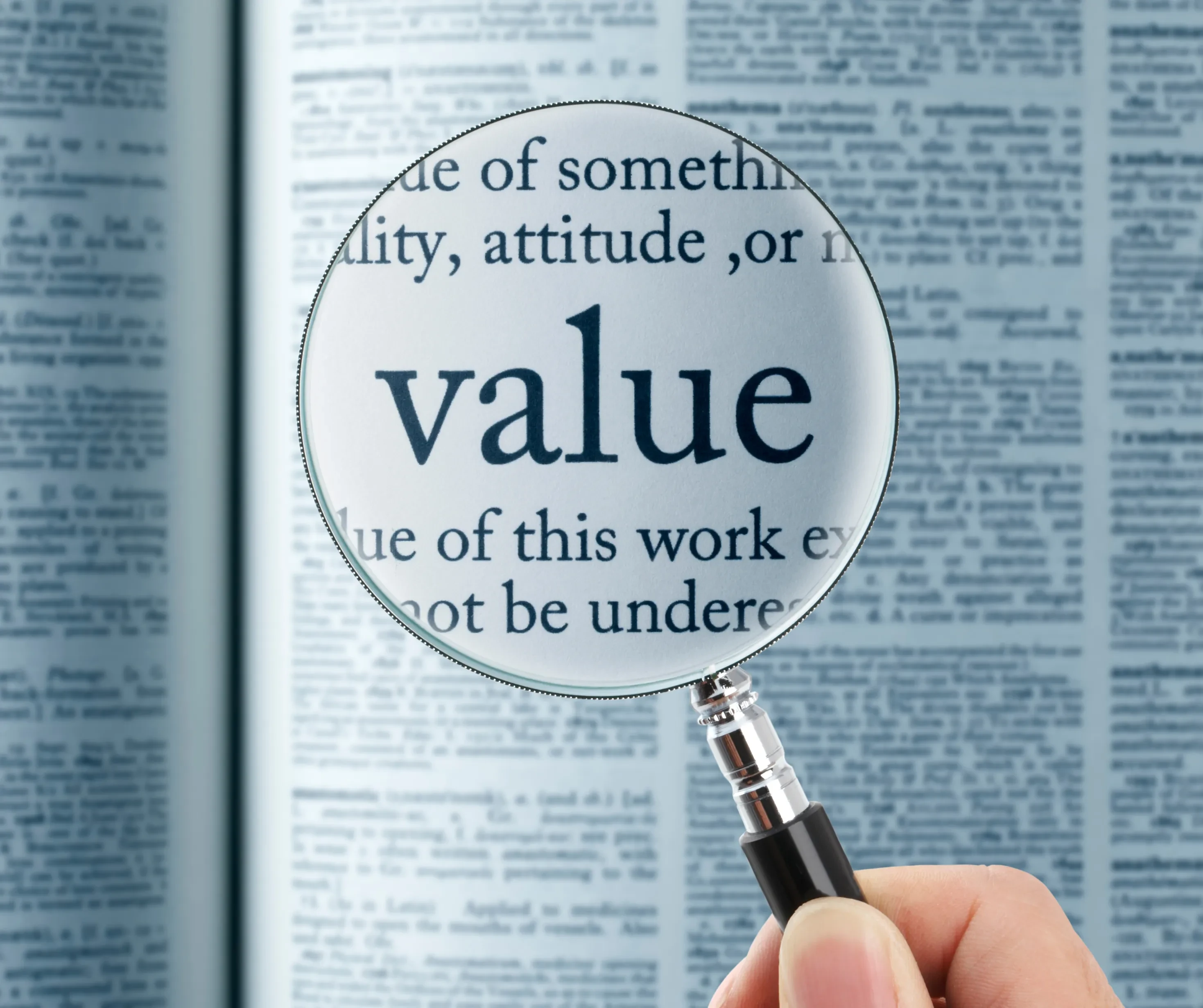 magnifying glass showing the word value