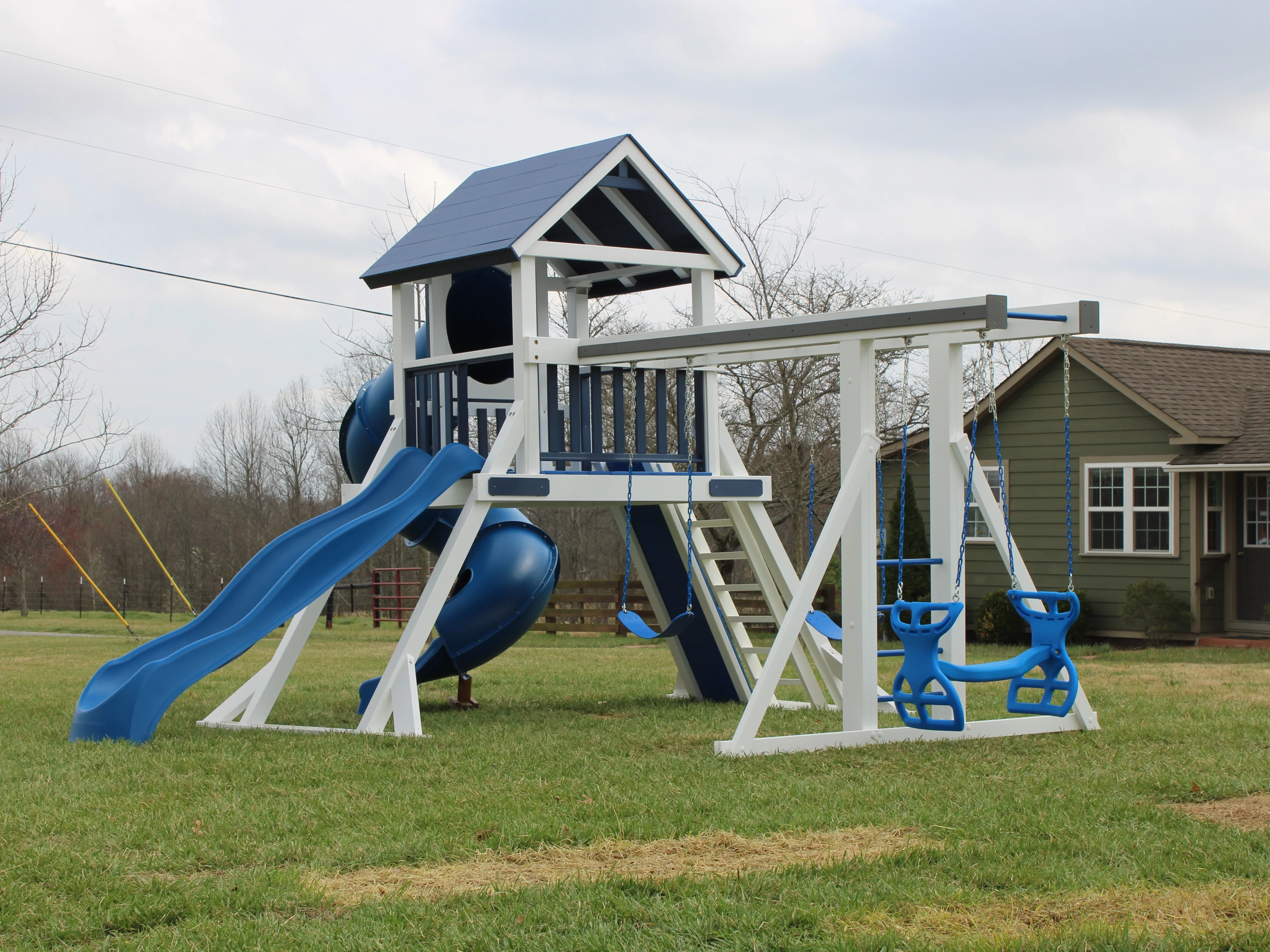 a complex white and blue vinyl playset
