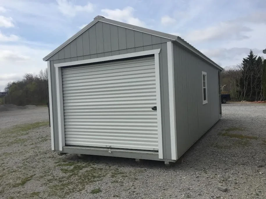 the back wall of a cabin that has a 9x7 rollup door closed