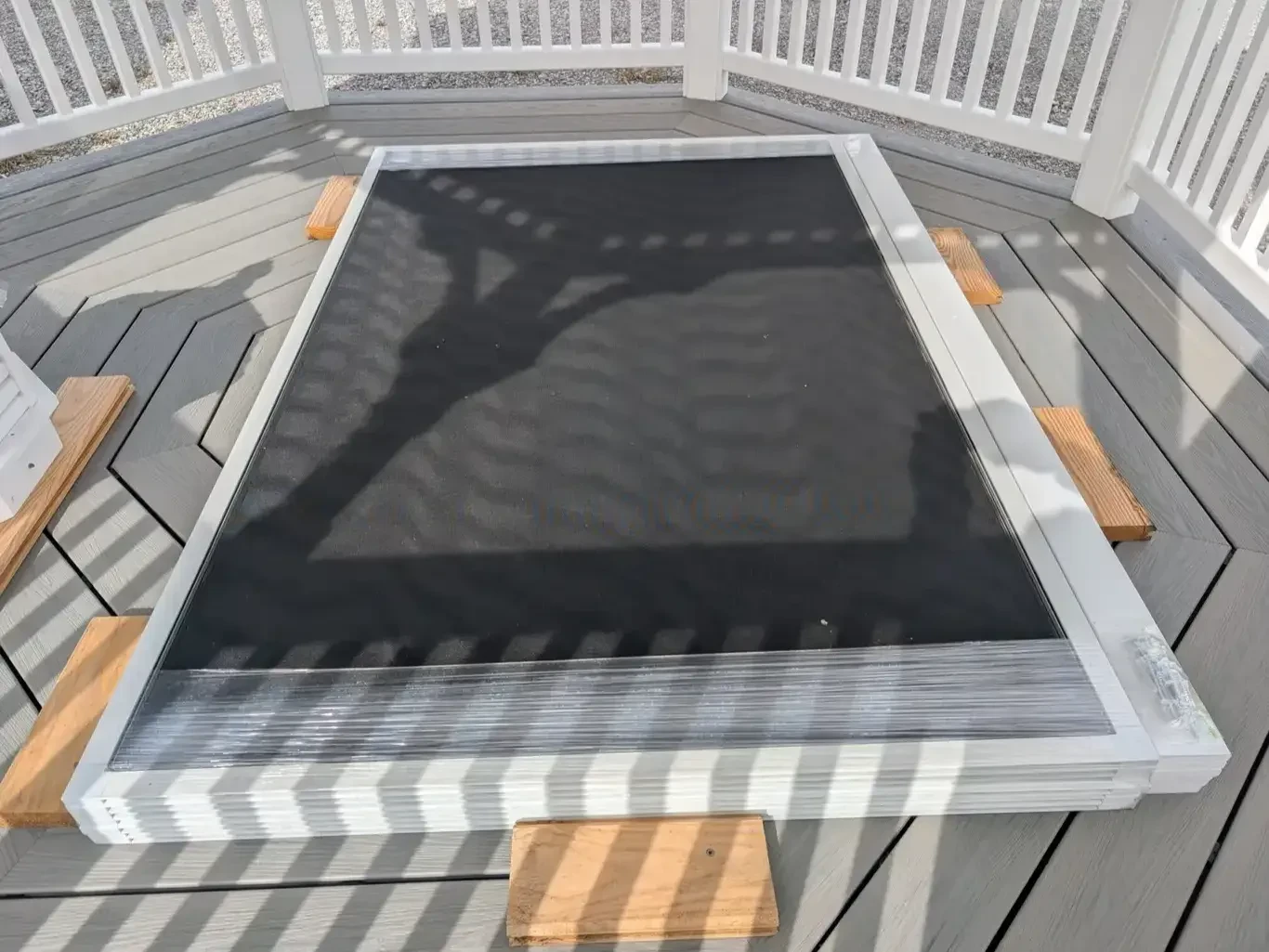 screens with a white vinyl frame that go attach to a gazebo so it can be fully screened in